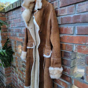 Leather coat with shearling inside, size medium